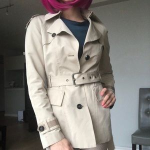 Beige stylish mini trench coat